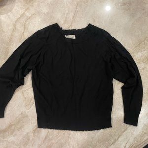 Black cashmere sweater with rough edge neck